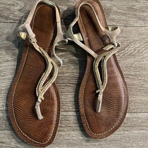 Sandals with gold accents